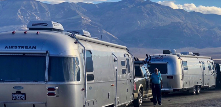Airstreams in front of mountains